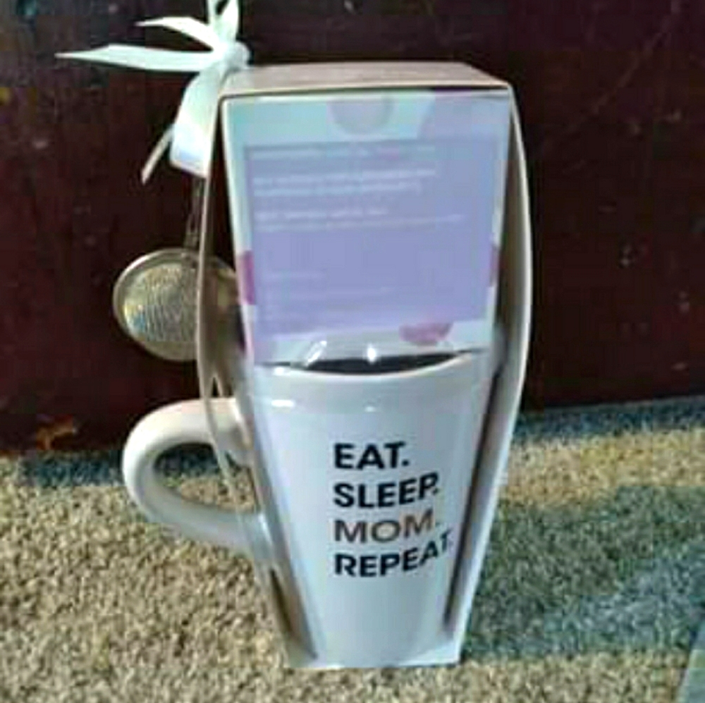 White jasmine tea and mug with strainer